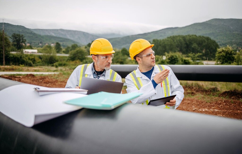 engineers checking gas pipeline